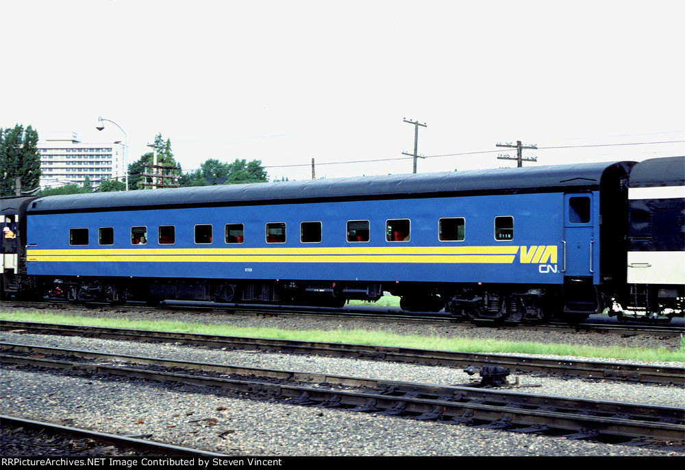 Canadian National coach CN #5728 operating in VIA livery